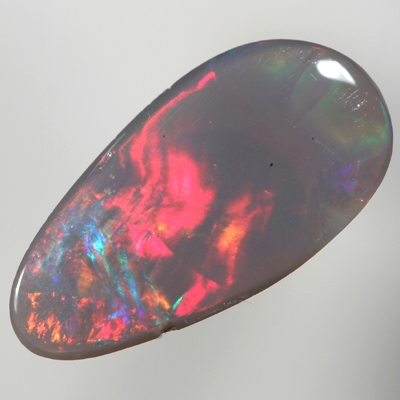 SOLID SEMI BLACK OPAL Large and bright red rolling flash turns to green in a Flame pattern